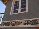 Images of fish and the sea fill both the inside and outside of the home.